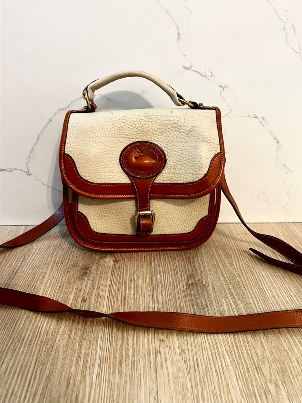 Dooney & Bourke Cream and Brown Pebbled Leather Crossbody Bag